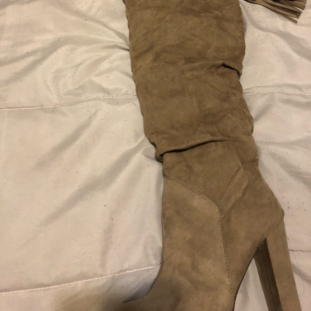 Brand new, never used over the knee boots.